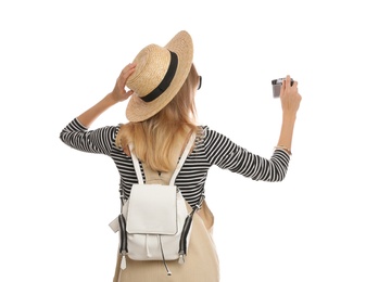 Photo of Woman with backpack taking picture on white background, back view. Summer travel