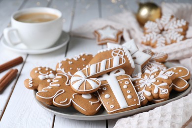Photo of Delicious Christmas cookies on white wooden table