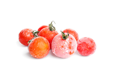 Frozen tomatoes isolated on white. Vegetable preservation