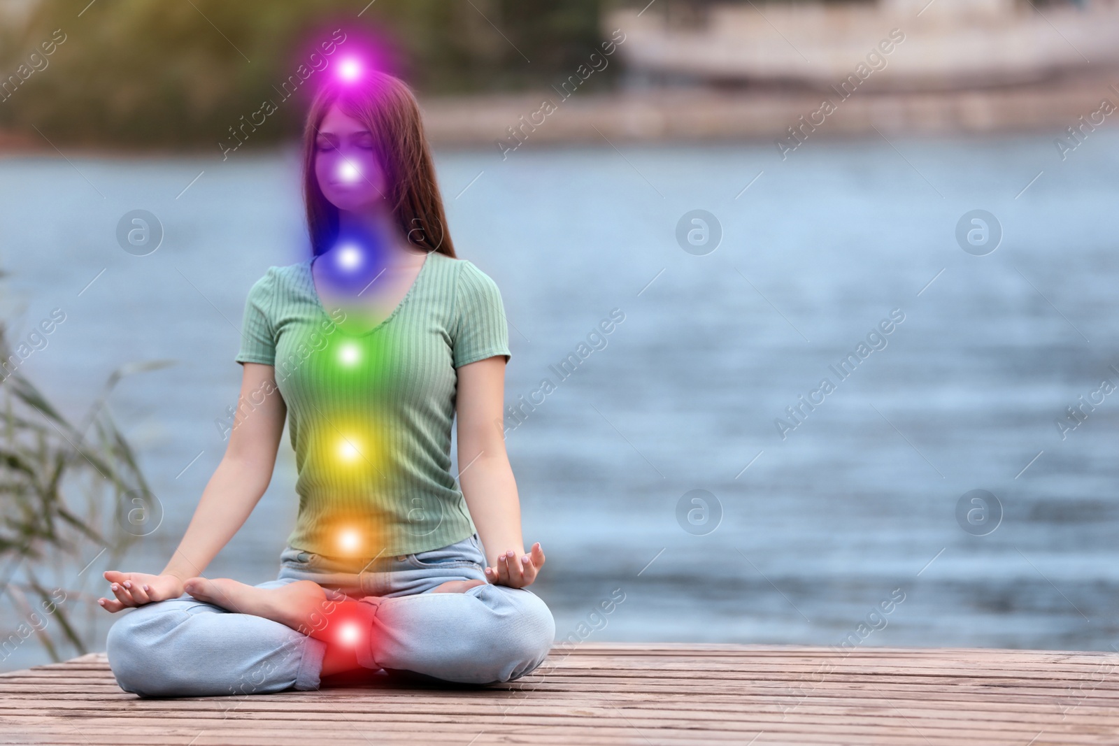 Image of Teenage girl meditating near river. Scheme of seven chakras, illustration