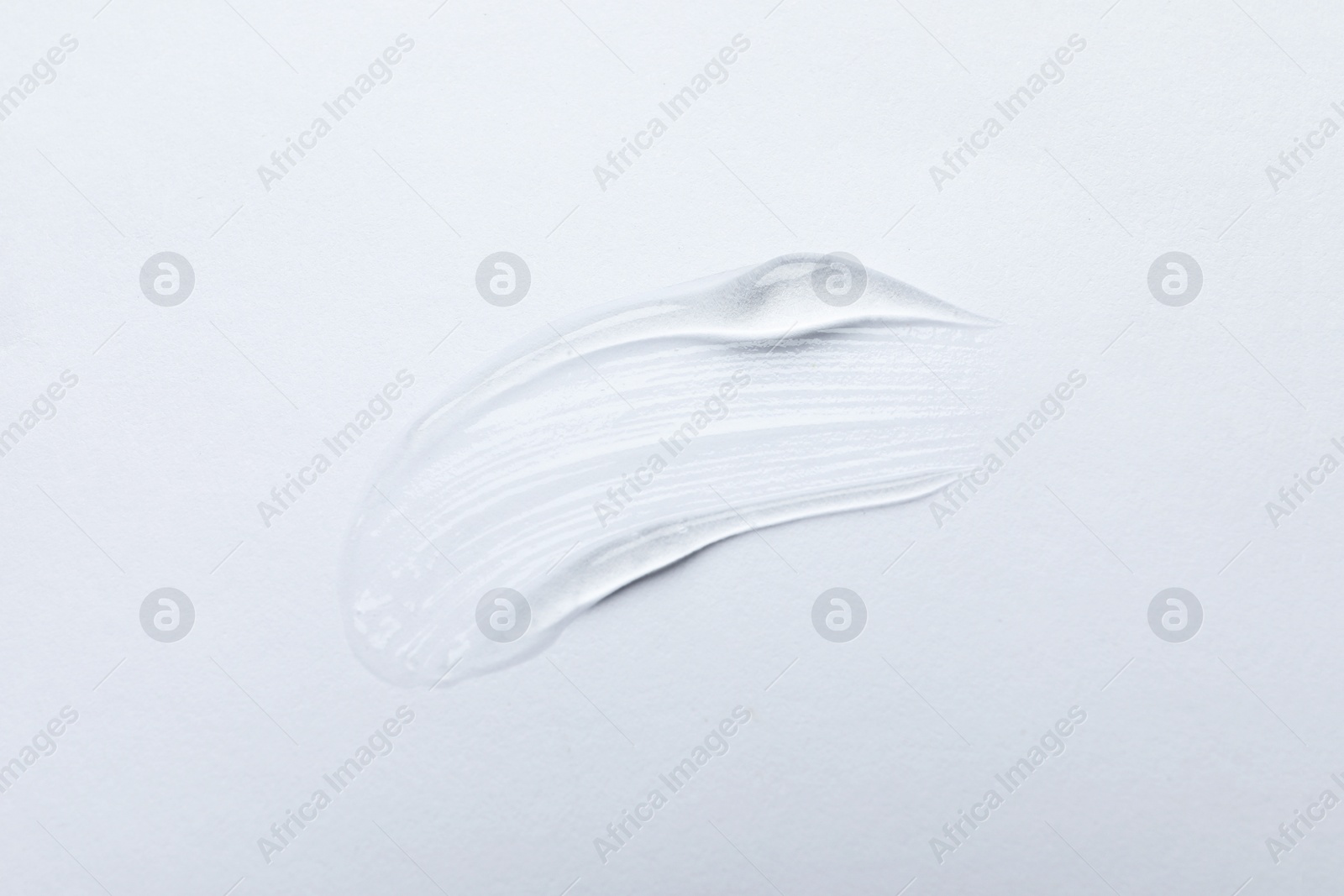 Photo of Swatch of cosmetic gel on white background, top view