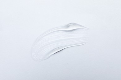 Photo of Swatch of cosmetic gel on white background, top view