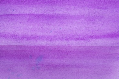 Photo of Abstract purple watercolor painting as background, top view
