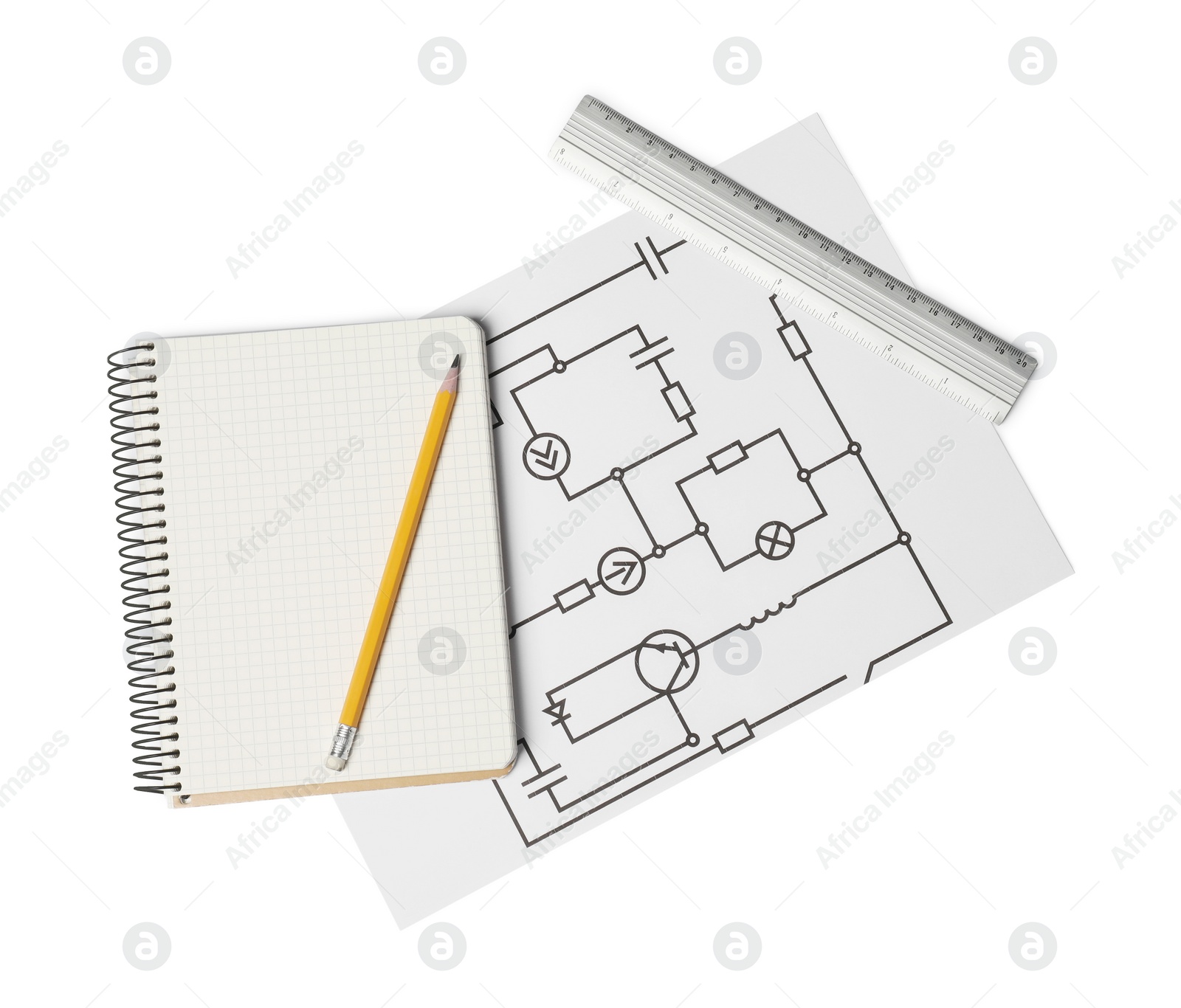 Photo of Wiring diagram, ruler and notepad isolated on white, top view