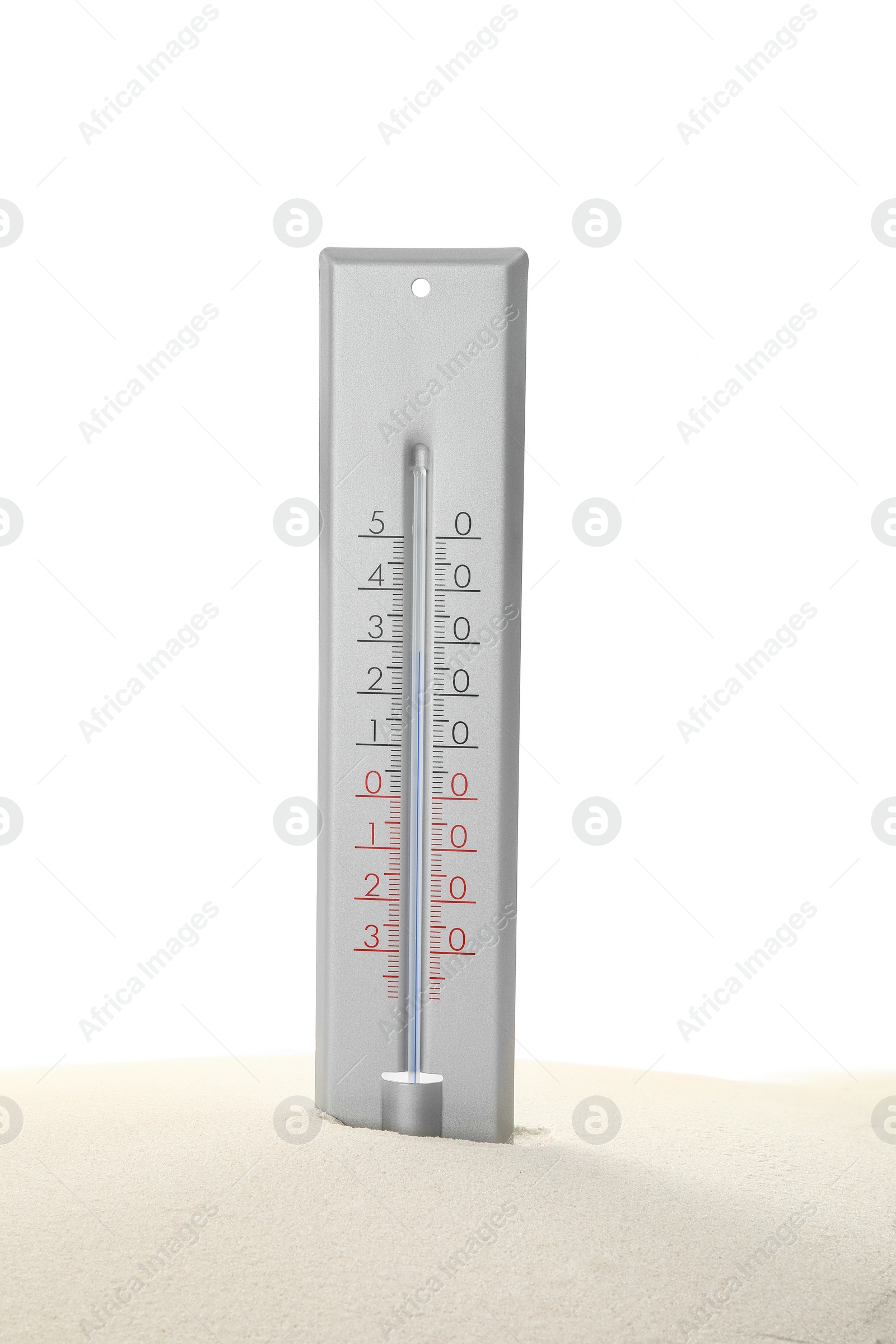 Photo of Weather thermometer in sand against white background