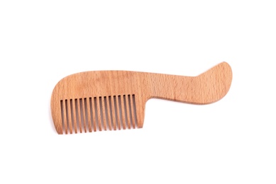 Photo of New wooden hair comb on white background, top view