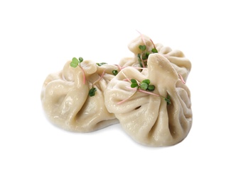 Photo of Tasty baozi dumplings with sprouts on white background