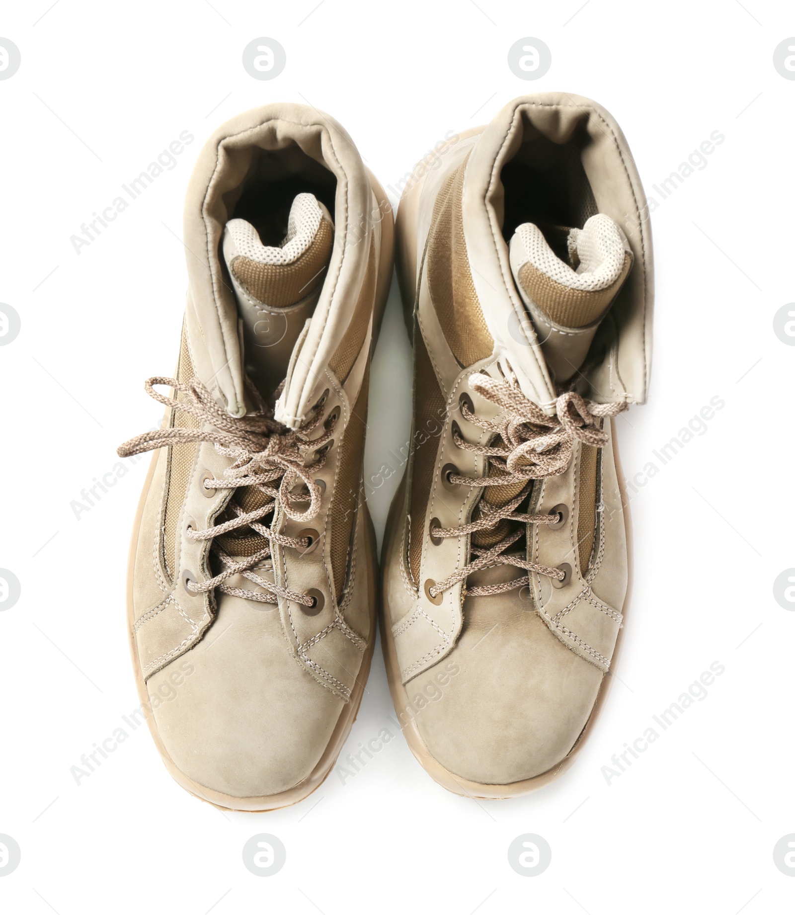 Photo of Pair of combat boots on white background