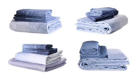 Image of Set with stacks of clean bed linen on white background