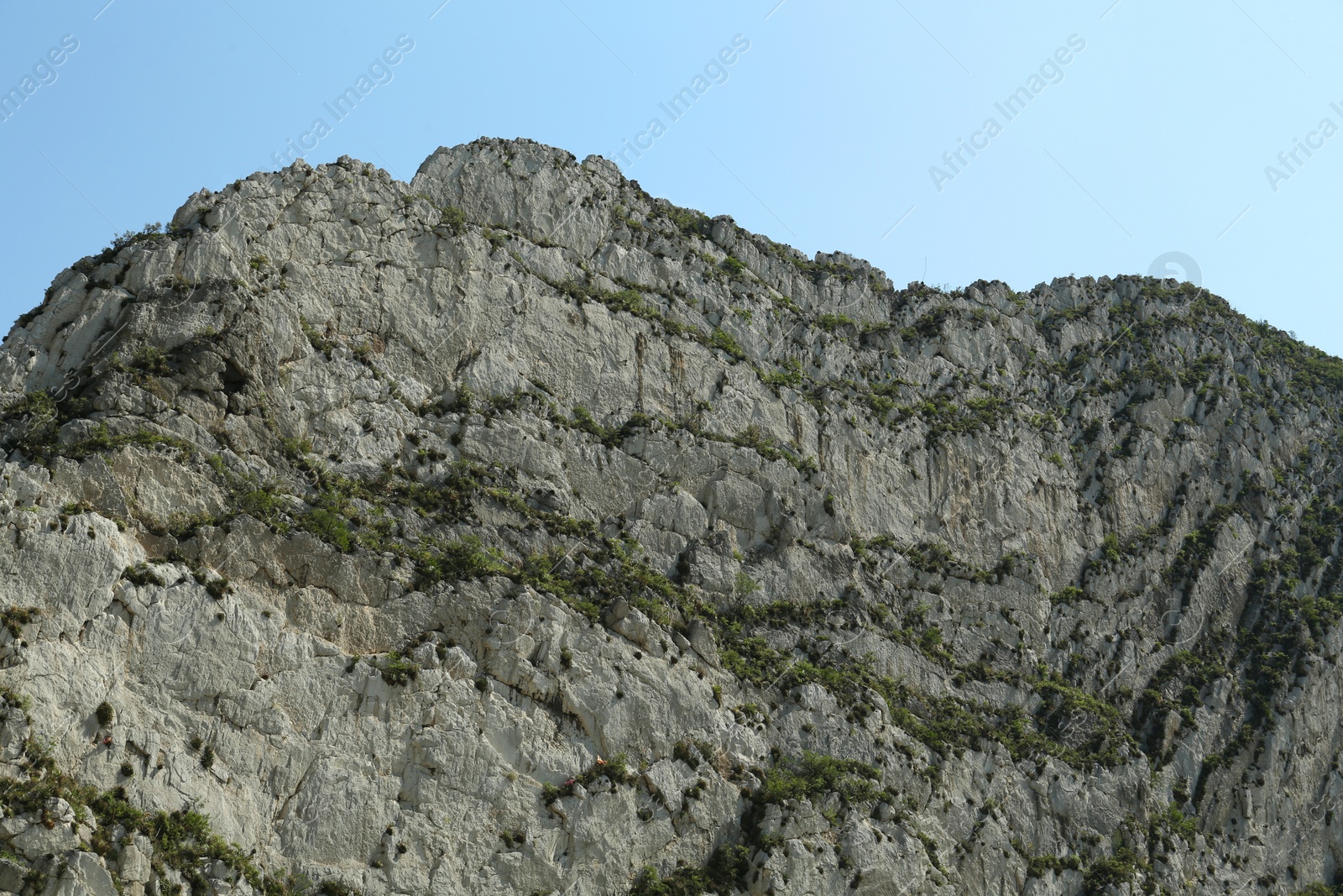 Photo of Picturesque landscape with high mountains under blue sky outdoors