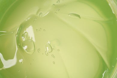 Texture of aloe gel as background, top view