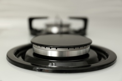 Modern built-in gas cooktop, closeup. Kitchen appliance