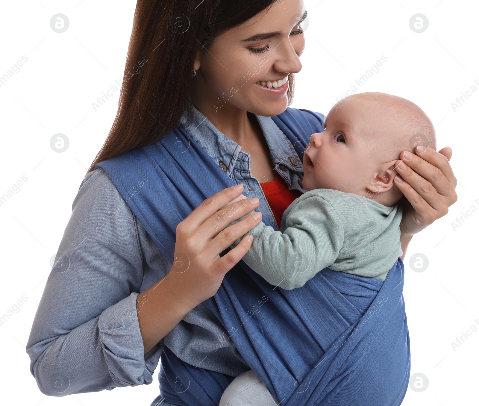 Photo of Mother holding her child in sling (baby carrier) on white background, closeup