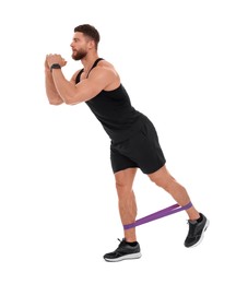 Young man exercising with elastic resistance band on white background