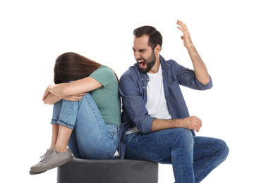 Photo of Man shouting at his girlfriend on white background. Relationship problems