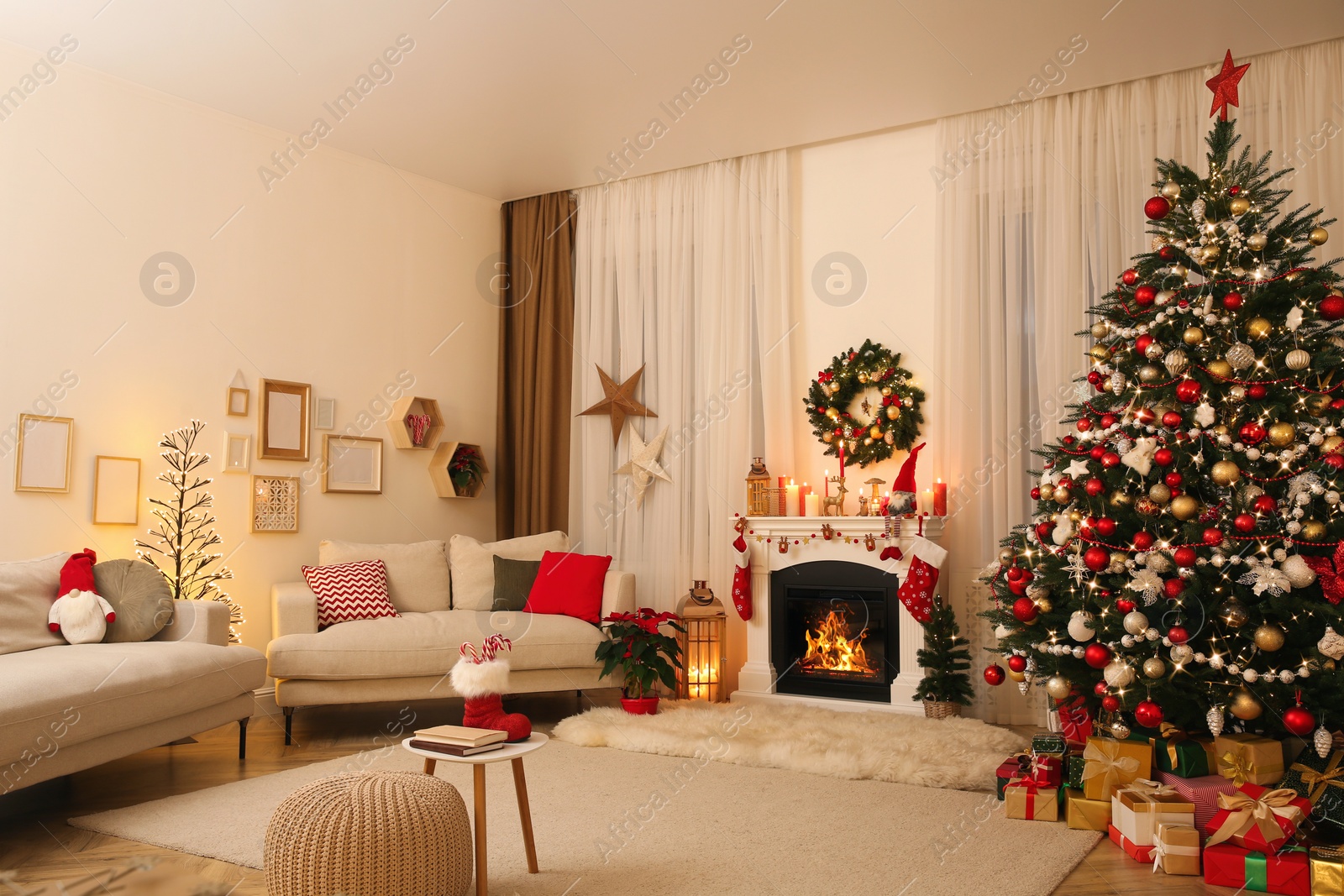 Photo of Festive living room interior with Christmas tree near fireplace