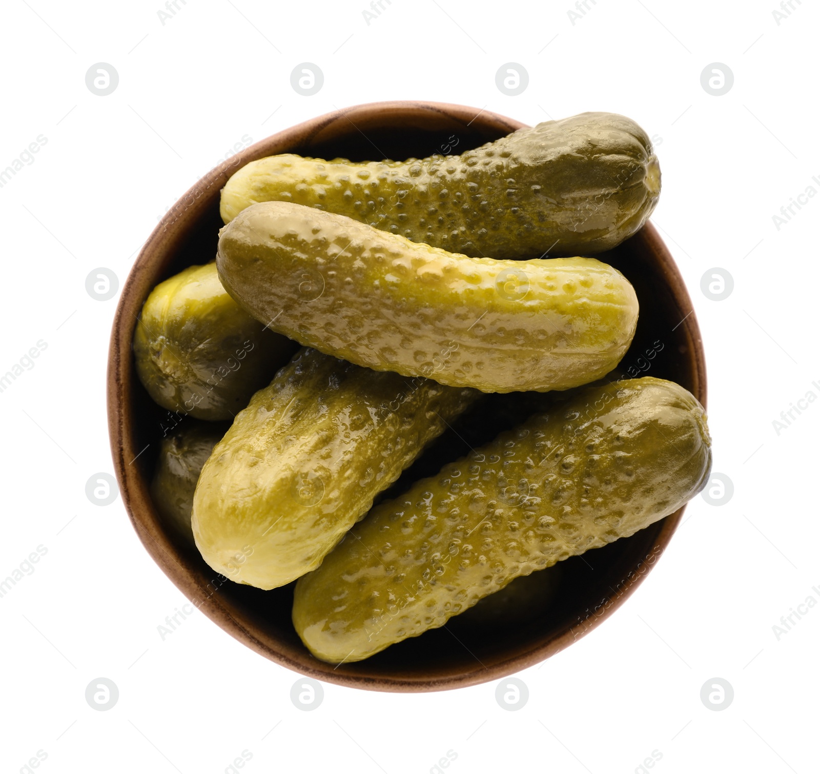 Photo of Bowl of tasty pickled cucumbers isolated on white, top view