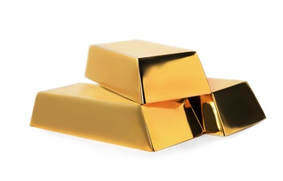 Photo of Precious shiny gold bars on white background