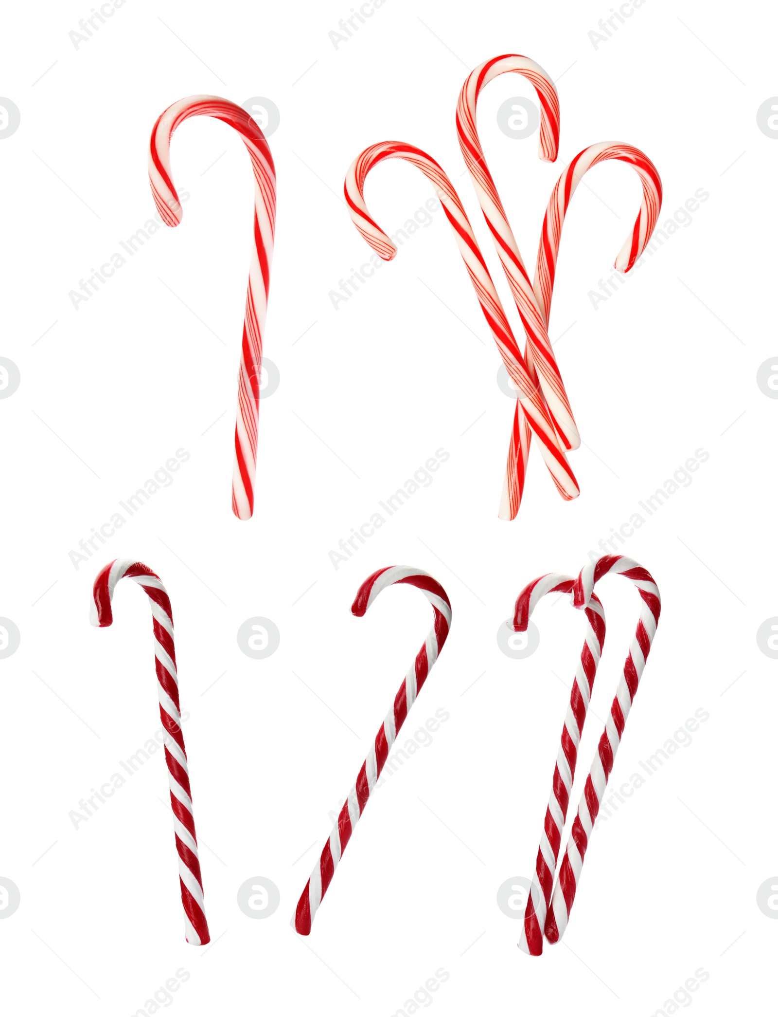 Image of Set of tasty Christmas candy canes on white background