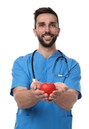 Doctor with stethoscope and red heart on white background. Cardiology concept