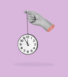 Image of Man holding clock in hand on color background. Creative art design