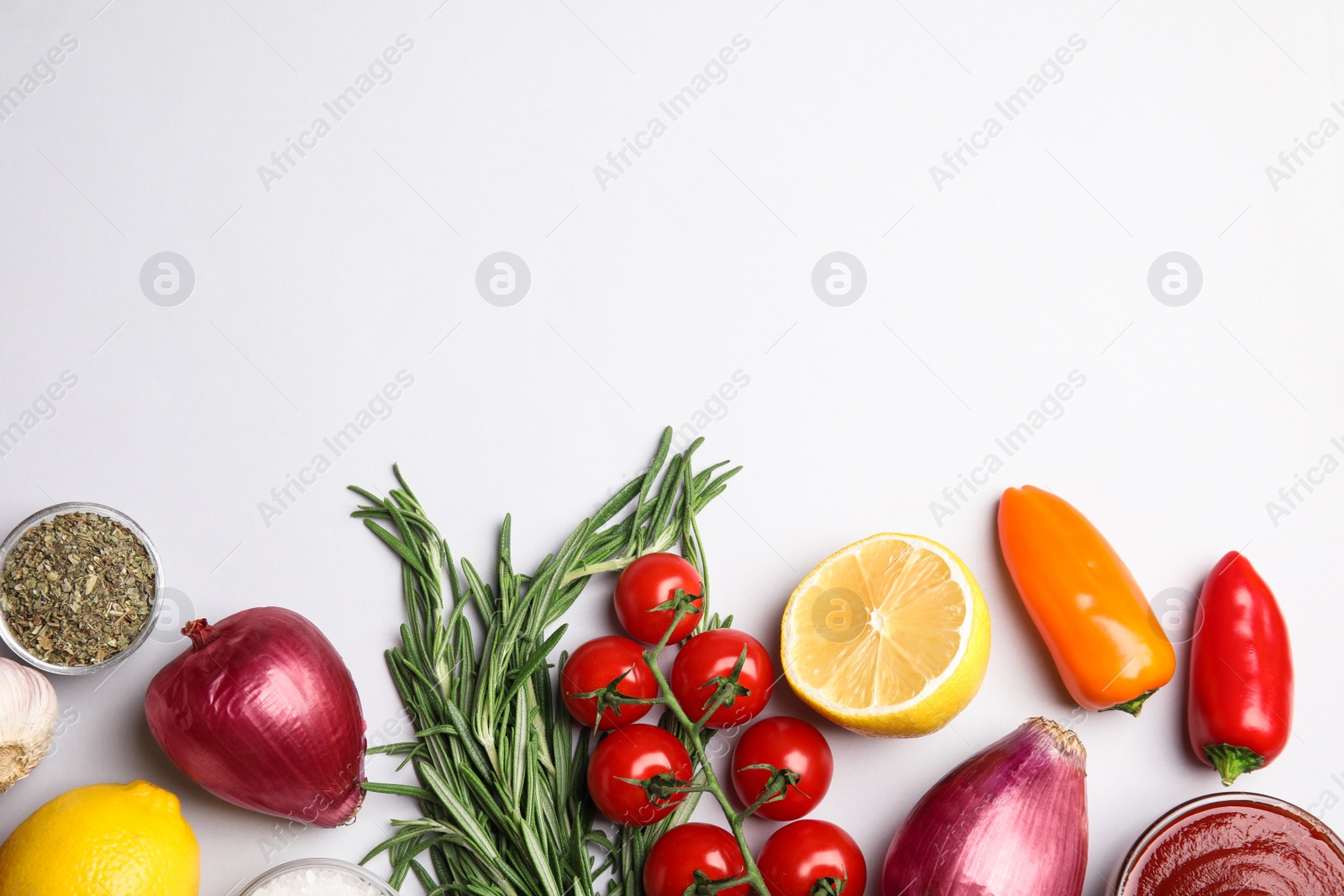 Photo of Flat lay composition with ingredients for cooking on white background. Space for text