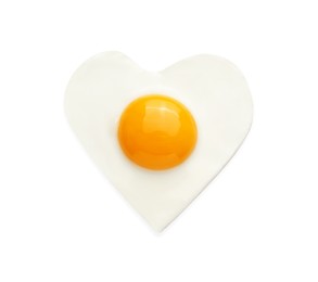 Photo of Tasty fried egg in shape of heart isolated on white, top view