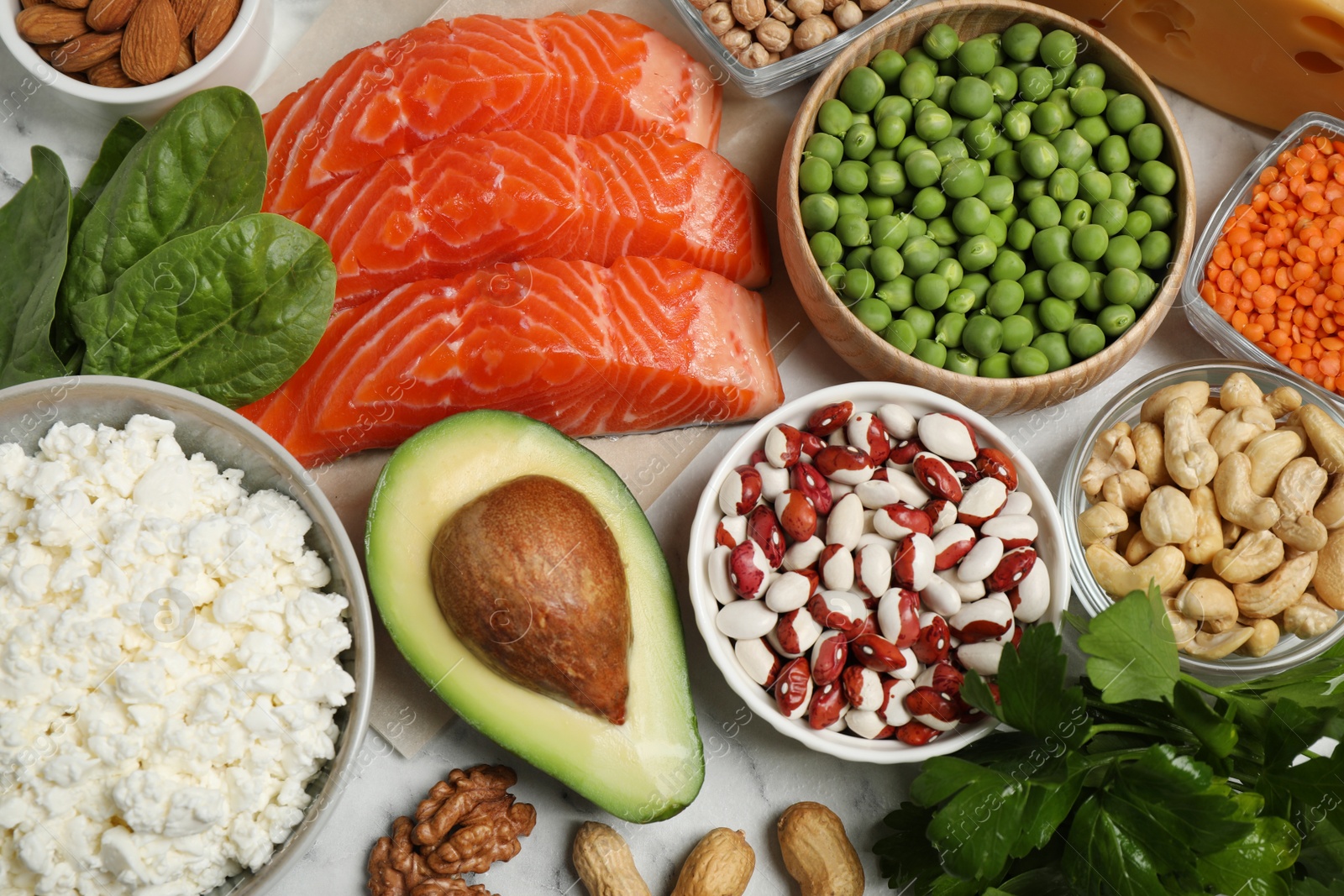 Photo of Products rich in protein on table, flat lay