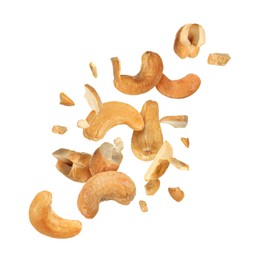 Image of Tasty cashew nuts flying on white background