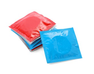 Condom packages isolated on white. Safe sex