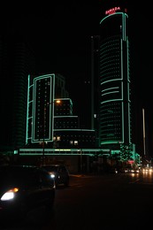 BATUMI, GEORGIA - JUNE 09, 2022: Night cityscape with illuminated building of Ramada Hotel