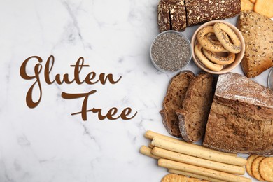 Image of Different gluten free products on white marble table, flat lay