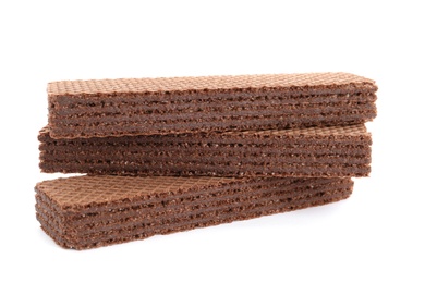 Photo of Delicious crispy wafers on white background. Sweet food