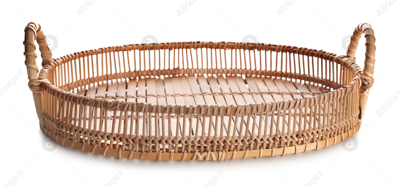 Photo of One empty wicker tray isolated on white