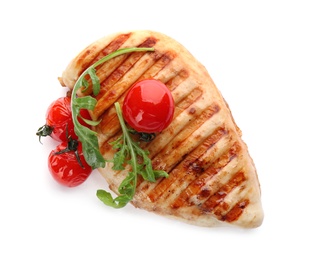 Photo of Tasty grilled chicken fillet with tomatoes and arugula isolated on white, top view