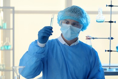 Photo of Scientist working with sample in laboratory. Medical research