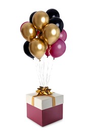 Image of Bunch of balloons and beautiful gift box with bow on white background