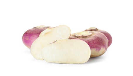 Photo of Cut and whole fresh ripe turnips on white background