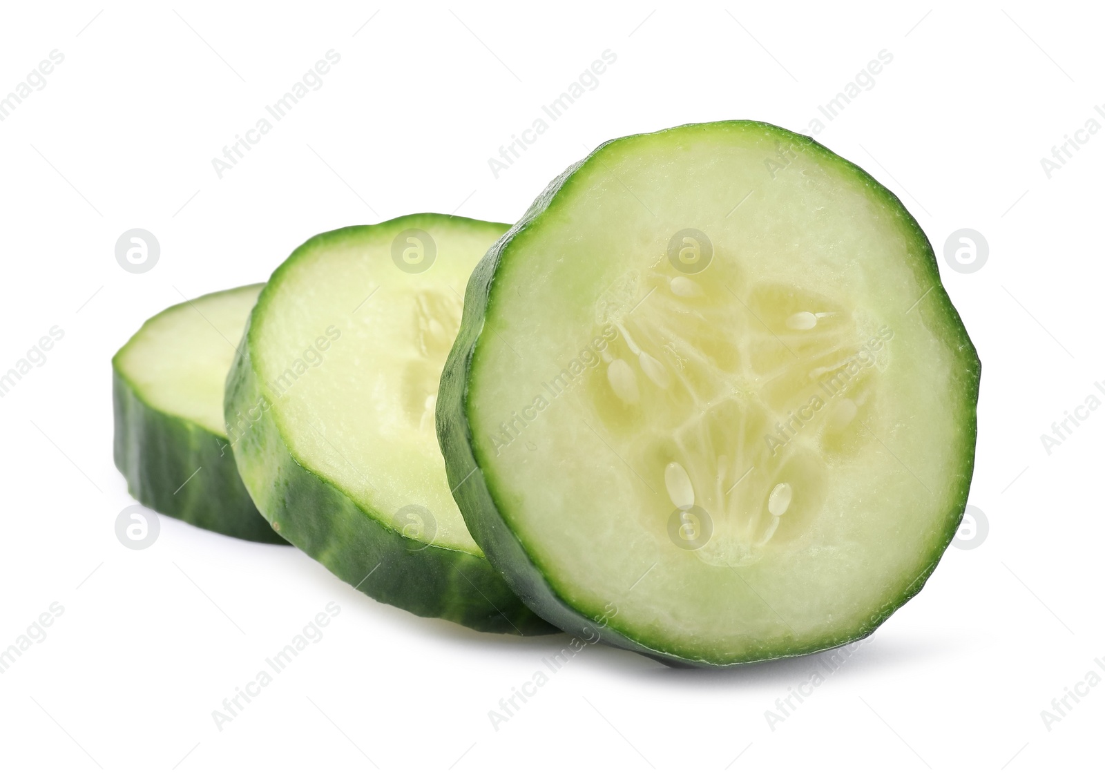 Photo of Slices of long cucumber isolated on white