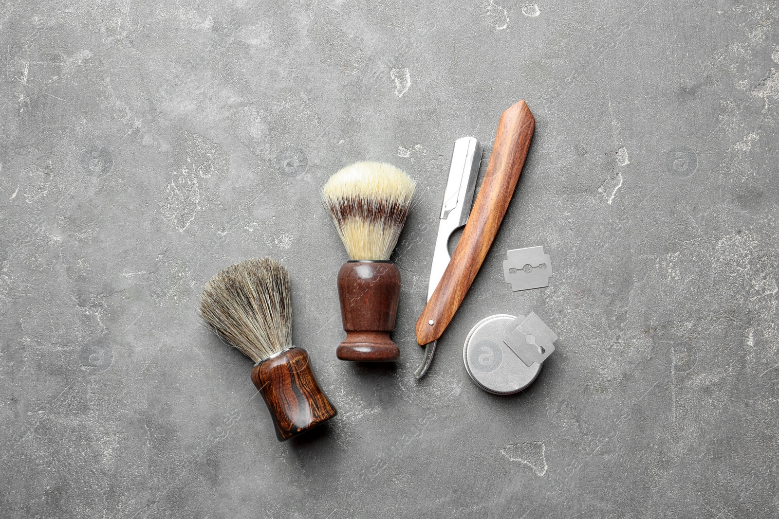 Photo of Flat lay composition with shaving accessories for men on gray background