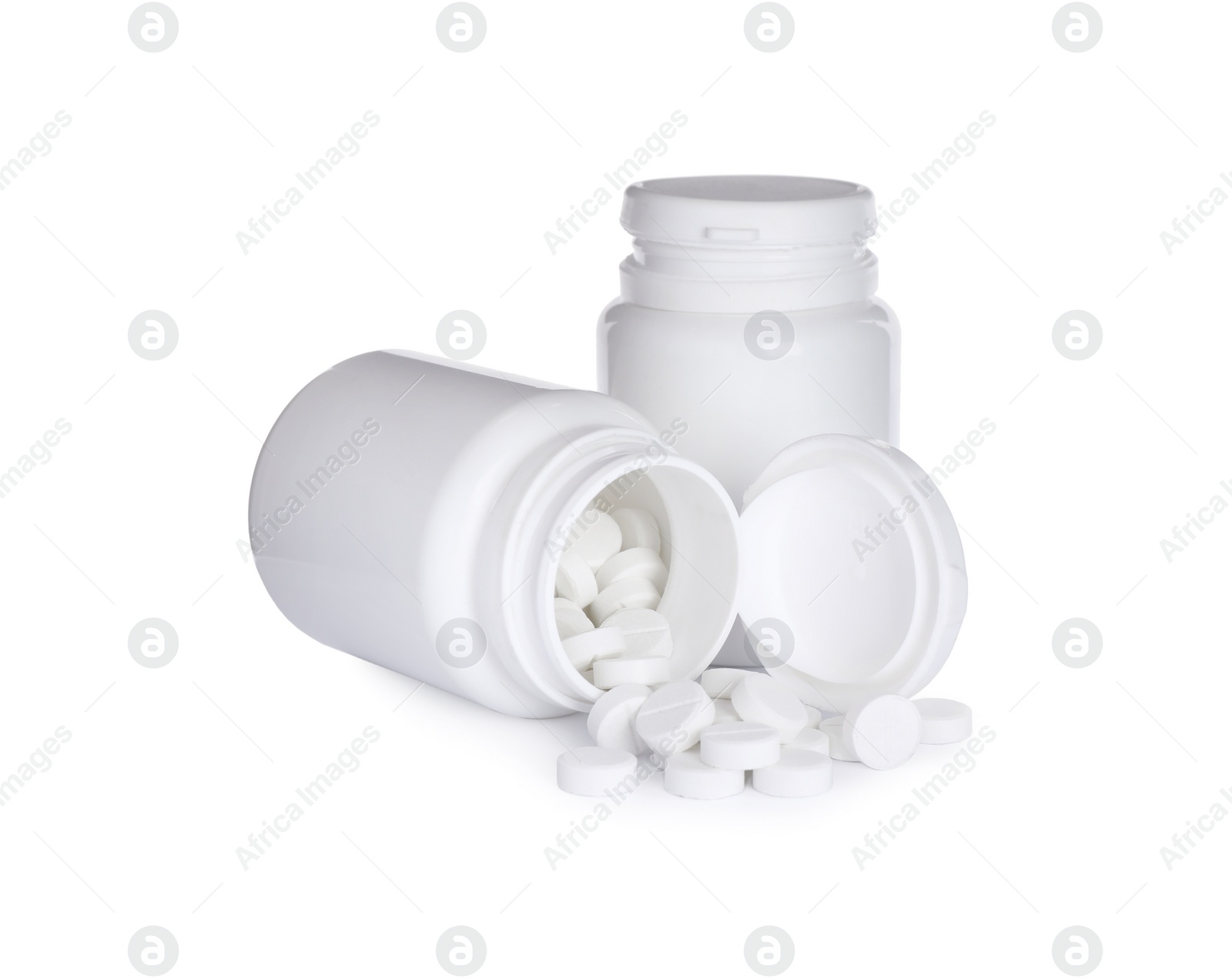 Photo of Bottles with vitamin pills on white background