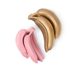 Photo of Stylish gold and pink bananas on white background, top view