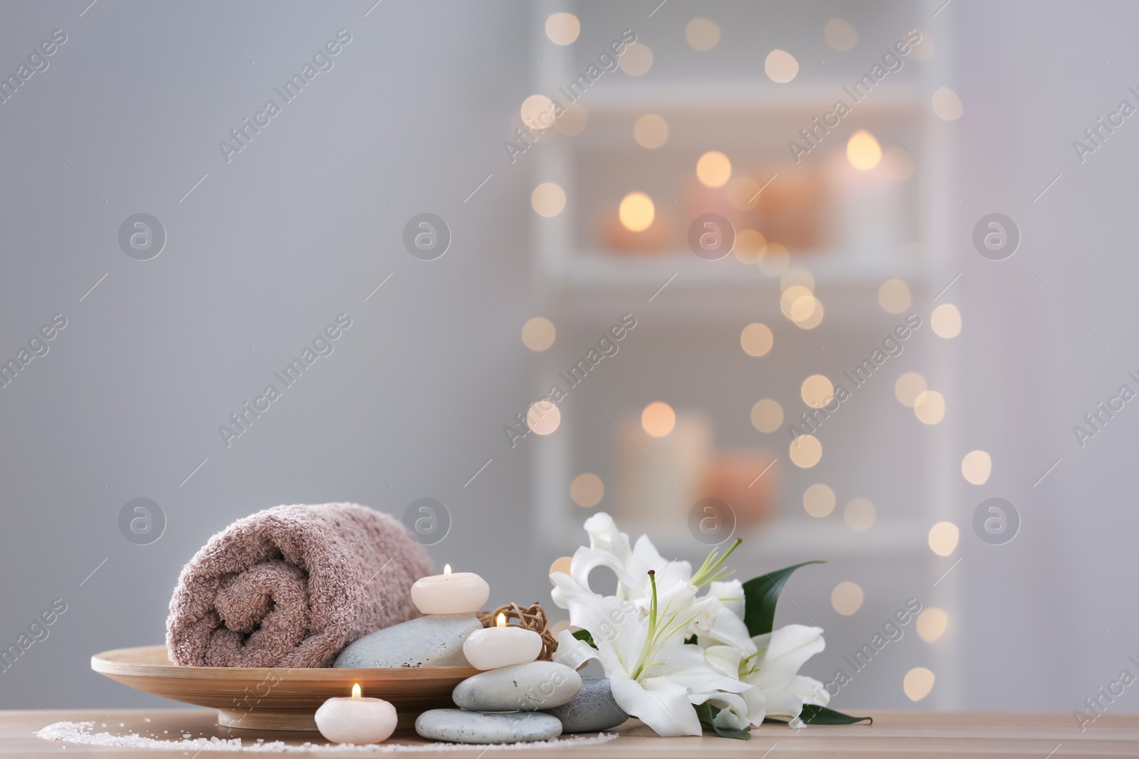 Photo of Beautiful spa composition on table in wellness center