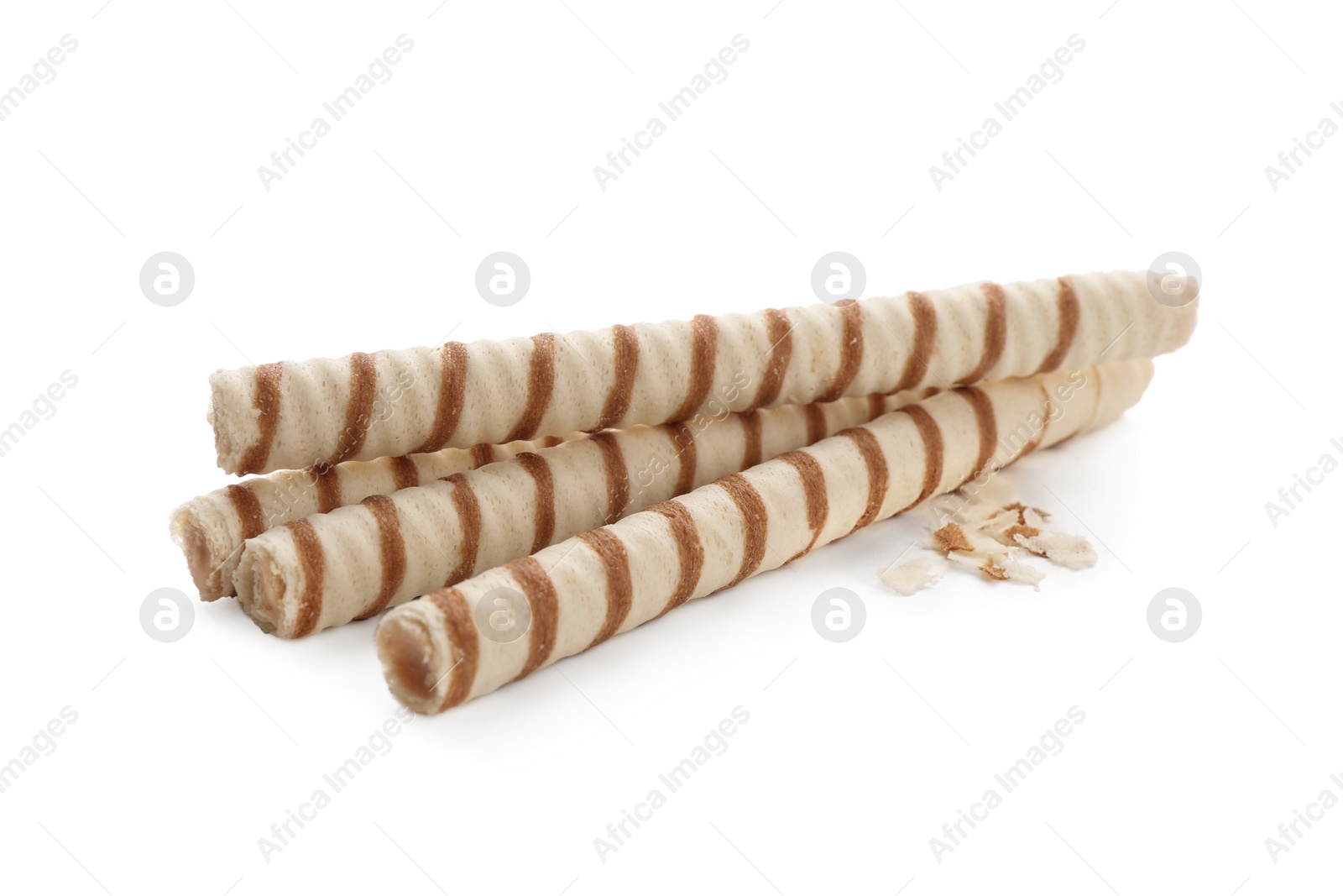 Photo of Tasty wafer roll sticks on white background. Crispy food