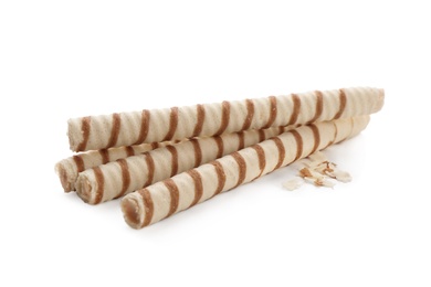 Tasty wafer roll sticks on white background. Crispy food