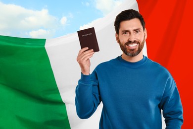 Immigration. Happy man with passport and national flag of Italy against blue sky, space for text
