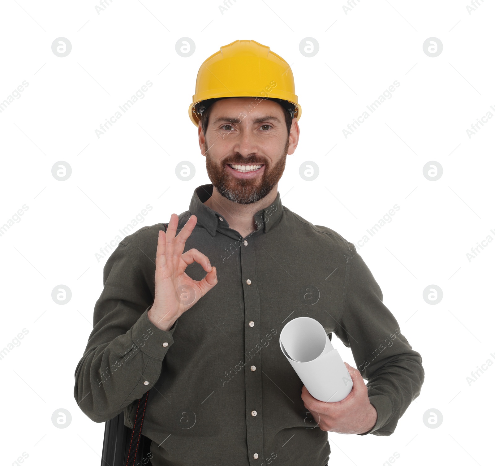 Photo of Architect in hard hat with drawing tube and draft showing OK gesture on white background