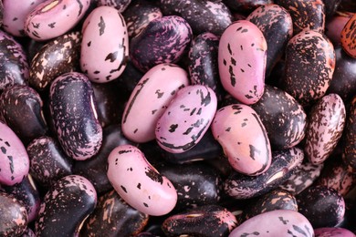 Photo of Many dry kidney beans as background, top view