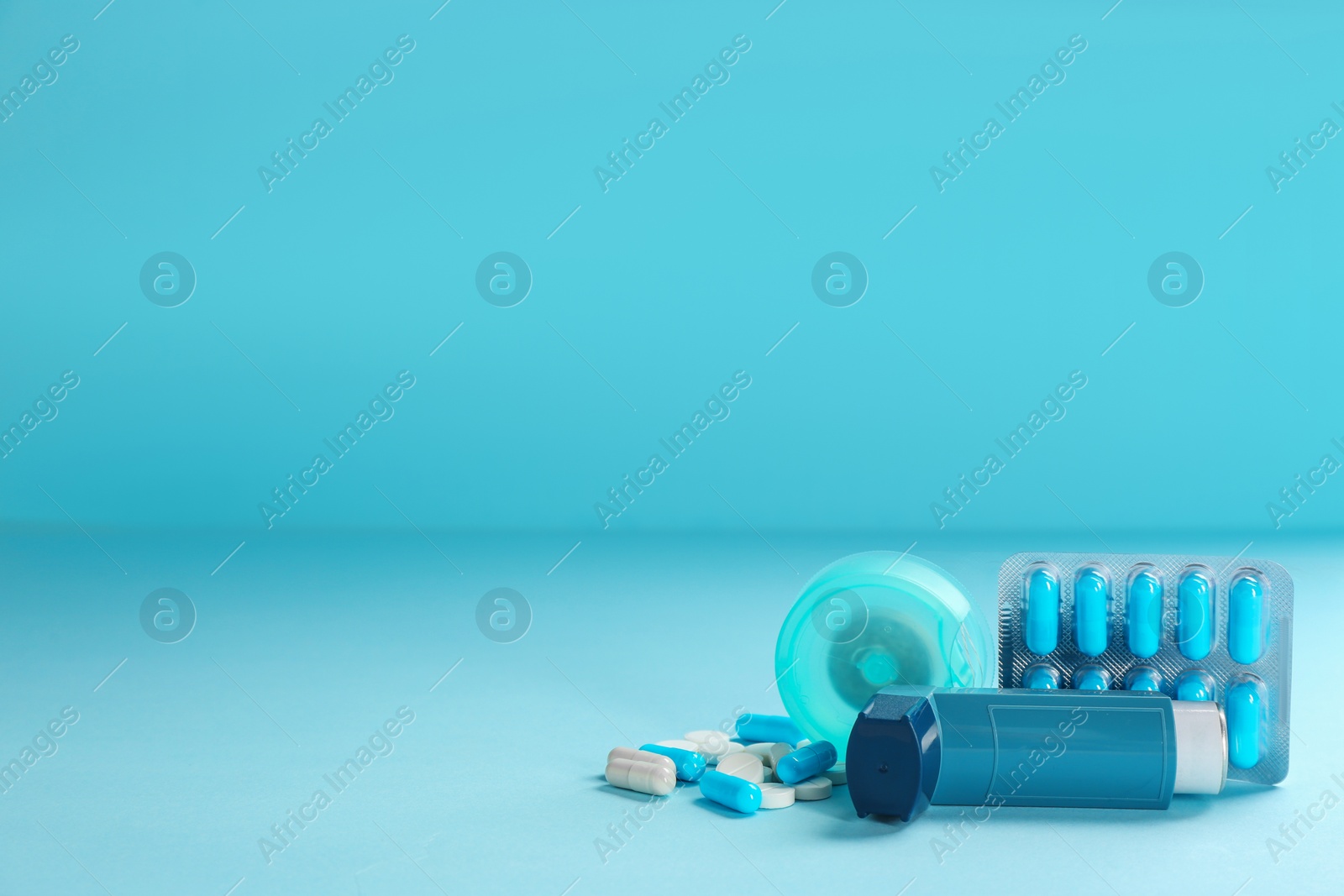 Photo of Asthma medications and space for text on color background