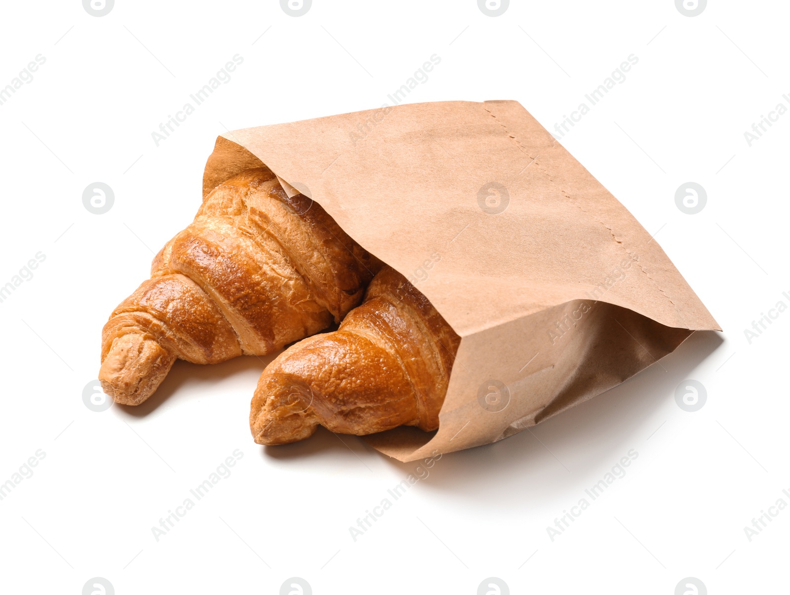 Photo of Paper bag with croissants on white background. Space for design